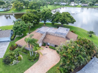 Rare 4-Bedroom CBS Home in Eastpointe with 160' of Breathtaking on Eastpointe Country Club in Florida - for sale on GolfHomes.com, golf home, golf lot