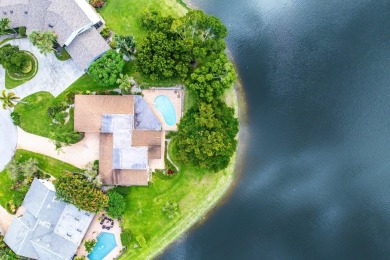 Rare 4-Bedroom CBS Home in Eastpointe with 160' of Breathtaking on Eastpointe Country Club in Florida - for sale on GolfHomes.com, golf home, golf lot