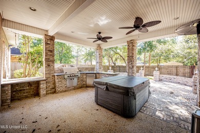 Elegant updated home in the highly sought after Diamondhead on Diamondhead Country Club in Mississippi - for sale on GolfHomes.com, golf home, golf lot