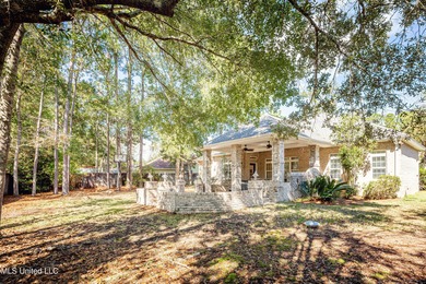 Elegant updated home in the highly sought after Diamondhead on Diamondhead Country Club in Mississippi - for sale on GolfHomes.com, golf home, golf lot