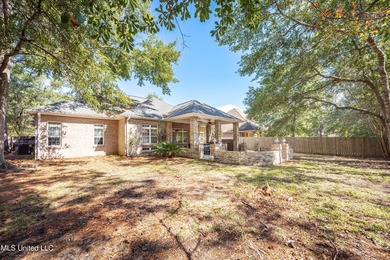 Elegant updated home in the highly sought after Diamondhead on Diamondhead Country Club in Mississippi - for sale on GolfHomes.com, golf home, golf lot