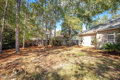 Elegant updated home in the highly sought after Diamondhead on Diamondhead Country Club in Mississippi - for sale on GolfHomes.com, golf home, golf lot