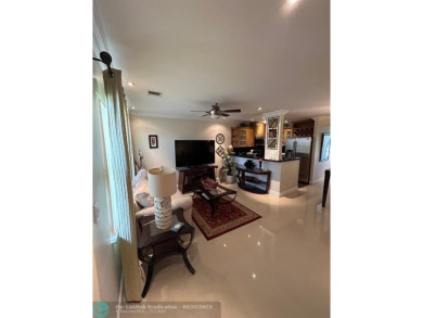 This 1Bed, 1Bath condo has an updated kitchen with granite on Sunrise Lakes Phase III in Florida - for sale on GolfHomes.com, golf home, golf lot