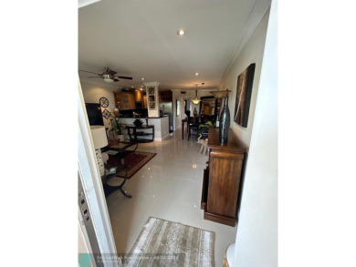 This 1Bed, 1Bath condo has an updated kitchen with granite on Sunrise Lakes Phase III in Florida - for sale on GolfHomes.com, golf home, golf lot