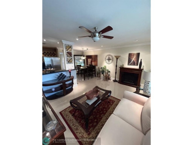 This 1Bed, 1Bath condo has an updated kitchen with granite on Sunrise Lakes Phase III in Florida - for sale on GolfHomes.com, golf home, golf lot