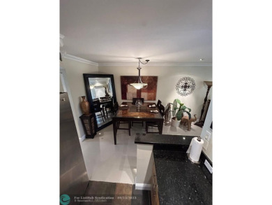 This 1Bed, 1Bath condo has an updated kitchen with granite on Sunrise Lakes Phase III in Florida - for sale on GolfHomes.com, golf home, golf lot