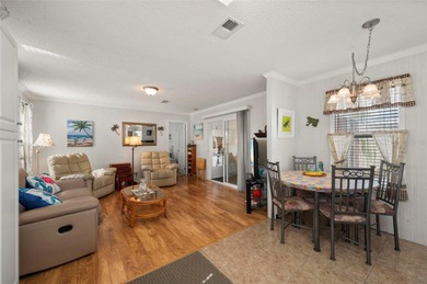 Rare opportunity to own a furnished 2-bedroom, 2-bath singlewide on Kings Gate Golf Club in Florida - for sale on GolfHomes.com, golf home, golf lot