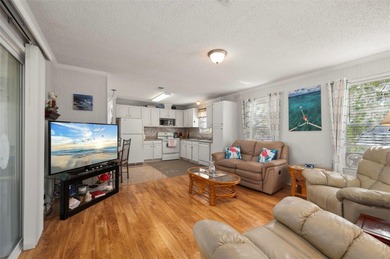 Rare opportunity to own a furnished 2-bedroom, 2-bath singlewide on Kings Gate Golf Club in Florida - for sale on GolfHomes.com, golf home, golf lot