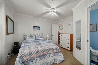 Rare opportunity to own a furnished 2-bedroom, 2-bath singlewide on Kings Gate Golf Club in Florida - for sale on GolfHomes.com, golf home, golf lot