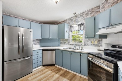NO BOND, NO CDD! Updated 2/2 home in the Village of Orange on El Diablo Executive Golf Course in Florida - for sale on GolfHomes.com, golf home, golf lot