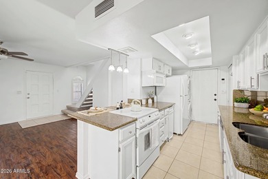 Discover this charming two-story townhome in the highly on Arizona Grand Resort Golf Course in Arizona - for sale on GolfHomes.com, golf home, golf lot