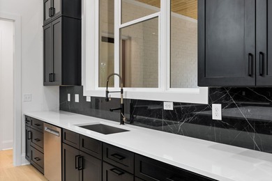 Built by Hawes Homes, this spacious Brick Ranch situated on a on Harbor Club Golf and Country Club in Georgia - for sale on GolfHomes.com, golf home, golf lot