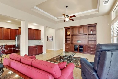 Beautifully positioned on a corner lot, this elegant Rialta home on Wildhorse Golf Club of Robson Ranch in Texas - for sale on GolfHomes.com, golf home, golf lot