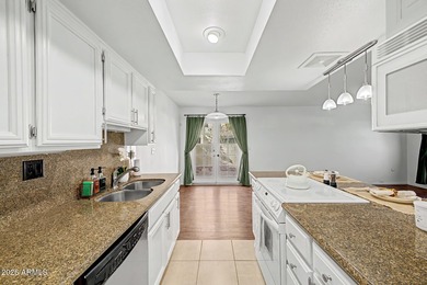 Discover this charming two-story townhome in the highly on Arizona Grand Resort Golf Course in Arizona - for sale on GolfHomes.com, golf home, golf lot