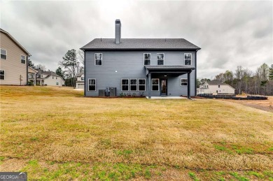 Experience modern comfort and timeless design at 215 Preserve on Traditions of Braselton Golf Club in Georgia - for sale on GolfHomes.com, golf home, golf lot