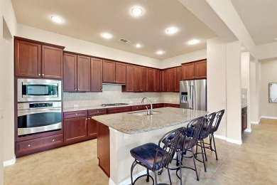 Beautifully positioned on a corner lot, this elegant Rialta home on Wildhorse Golf Club of Robson Ranch in Texas - for sale on GolfHomes.com, golf home, golf lot
