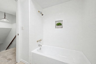 Discover this charming two-story townhome in the highly on Arizona Grand Resort Golf Course in Arizona - for sale on GolfHomes.com, golf home, golf lot