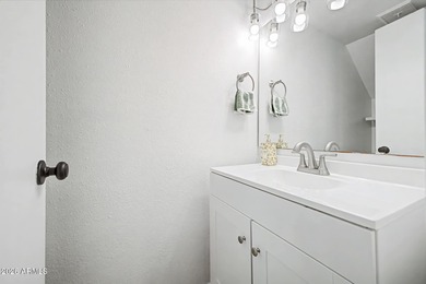 Discover this charming two-story townhome in the highly on Arizona Grand Resort Golf Course in Arizona - for sale on GolfHomes.com, golf home, golf lot