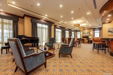 Step into a world of sophistication as you enter the grand foyer on North Hills Country Club in New York - for sale on GolfHomes.com, golf home, golf lot