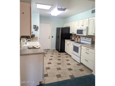 This quaint gemini home in Sun City is a great find for anyone on Sun City Country Club in Arizona - for sale on GolfHomes.com, golf home, golf lot