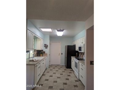 This quaint gemini home in Sun City is a great find for anyone on Sun City Country Club in Arizona - for sale on GolfHomes.com, golf home, golf lot