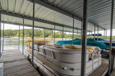 The Ultimate Lake Package - Condo  Boat  Boat Slip  Garage on Kimberling City Golf Club in Missouri - for sale on GolfHomes.com, golf home, golf lot