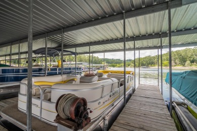 The Ultimate Lake Package - Condo  Boat  Boat Slip  Garage on Kimberling City Golf Club in Missouri - for sale on GolfHomes.com, golf home, golf lot