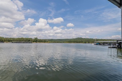 The Ultimate Lake Package - Condo  Boat  Boat Slip  Garage on Kimberling City Golf Club in Missouri - for sale on GolfHomes.com, golf home, golf lot