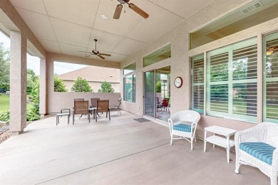 Beautifully positioned on a corner lot, this elegant Rialta home on Wildhorse Golf Club of Robson Ranch in Texas - for sale on GolfHomes.com, golf home, golf lot