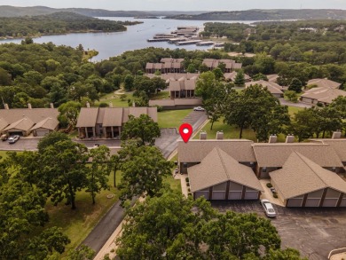 The Ultimate Lake Package - Condo  Boat  Boat Slip  Garage on Kimberling City Golf Club in Missouri - for sale on GolfHomes.com, golf home, golf lot