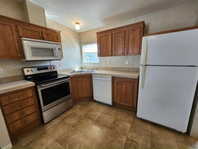 Make your new home in Lake Fairways, a well-maintained on Pine Lakes Country Club in Florida - for sale on GolfHomes.com, golf home, golf lot