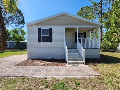 Make your new home in Lake Fairways, a well-maintained on Pine Lakes Country Club in Florida - for sale on GolfHomes.com, golf home, golf lot
