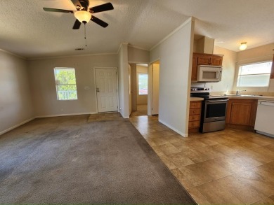 Make your new home in Lake Fairways, a well-maintained on Pine Lakes Country Club in Florida - for sale on GolfHomes.com, golf home, golf lot