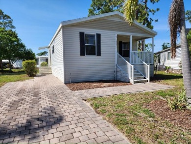 Make your new home in Lake Fairways, a well-maintained on Pine Lakes Country Club in Florida - for sale on GolfHomes.com, golf home, golf lot