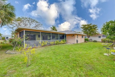 WELCOME HOME to this charming residence nestled across the on San Carlos Golf Club in Florida - for sale on GolfHomes.com, golf home, golf lot