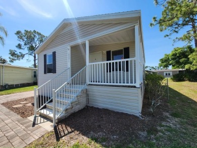 Make your new home in Lake Fairways, a well-maintained on Pine Lakes Country Club in Florida - for sale on GolfHomes.com, golf home, golf lot