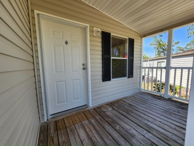 Make your new home in Lake Fairways, a well-maintained on Pine Lakes Country Club in Florida - for sale on GolfHomes.com, golf home, golf lot