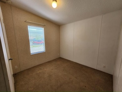 Make your new home in Lake Fairways, a well-maintained on Pine Lakes Country Club in Florida - for sale on GolfHomes.com, golf home, golf lot