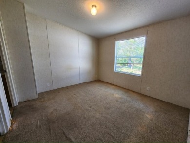 Make your new home in Lake Fairways, a well-maintained on Pine Lakes Country Club in Florida - for sale on GolfHomes.com, golf home, golf lot