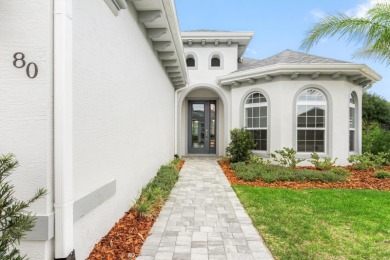 Welcome to refined coastal living in this beautifully crafted on Grand Haven Golf Club in Florida - for sale on GolfHomes.com, golf home, golf lot