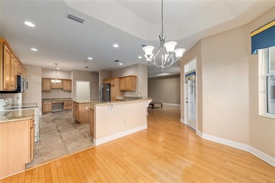 This updated Bridgeport Designer home with a golf cart garage is on Glenview Championship Golf and Country Club in Florida - for sale on GolfHomes.com, golf home, golf lot