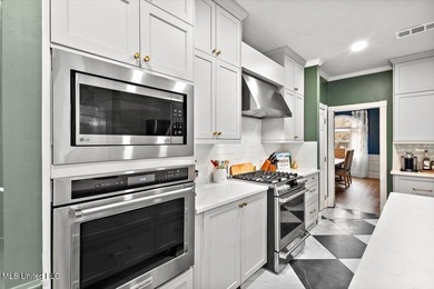 Elevated comfort meets thoughtful design in this completely on Annandale Golf Club in Mississippi - for sale on GolfHomes.com, golf home, golf lot