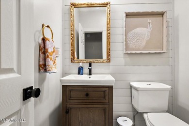 Elevated comfort meets thoughtful design in this completely on Annandale Golf Club in Mississippi - for sale on GolfHomes.com, golf home, golf lot