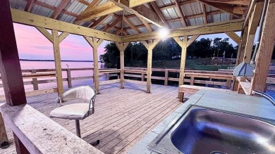Enjoy the best of lake living on two beautifully treed lots on Links At Lands End in Texas - for sale on GolfHomes.com, golf home, golf lot