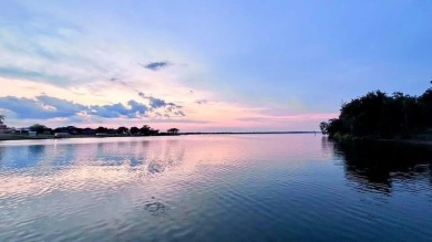 Enjoy the best of lake living on two beautifully treed lots on Links At Lands End in Texas - for sale on GolfHomes.com, golf home, golf lot