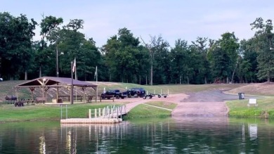 Enjoy the best of lake living on two beautifully treed lots on Links At Lands End in Texas - for sale on GolfHomes.com, golf home, golf lot