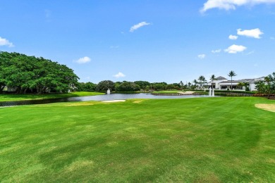 Immaculate penthouse condo with one of the best views in all of on Broken Sound Golf and Club  in Florida - for sale on GolfHomes.com, golf home, golf lot