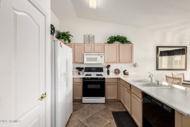 Immaculate 2 bed/2 bath furnished home w/full length covered on Springfield Golf Resort in Arizona - for sale on GolfHomes.com, golf home, golf lot