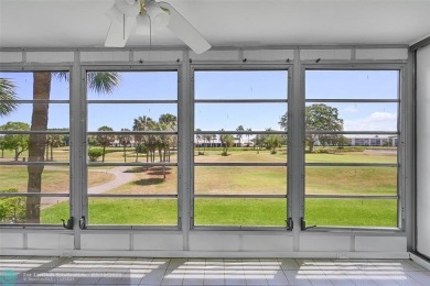 ARUBA VILLAGE IN THE HEART OF WYNMOOR WITH PANORAMIC GOLF COURSE on Wynmoor Golf Course in Florida - for sale on GolfHomes.com, golf home, golf lot