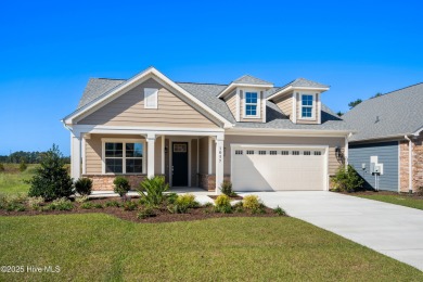 Ranch living at its best in this Promenade III Plan with on Ocean Ridge Plantation in North Carolina - for sale on GolfHomes.com, golf home, golf lot